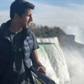 Ashar Ali’s headshot.