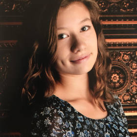 Dharma Hufnagel’s headshot.