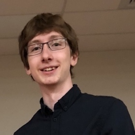 Seth Carpenter’s headshot.