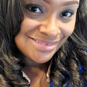 Ashley Akies’ headshot.