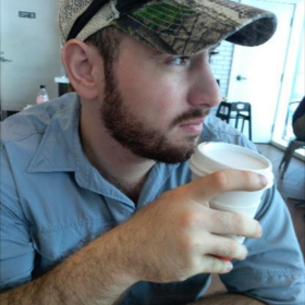 Edward Almasi’s headshot.