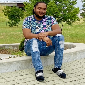 Mychal Butler-Thomas’ headshot.