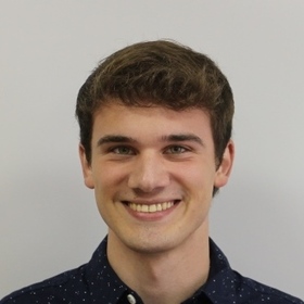 Joshua Carlton’s headshot.