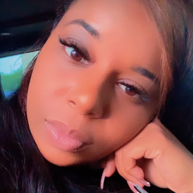 Ajahnah BaileyThompson’s headshot.