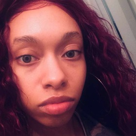 Amor Cosby’s headshot.