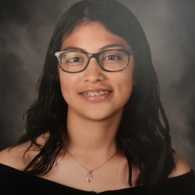 Emeli Alvarez-Vasquez’s headshot.