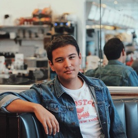 Justin Devilla’s headshot.