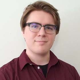 Joshua Pecenka’s headshot.