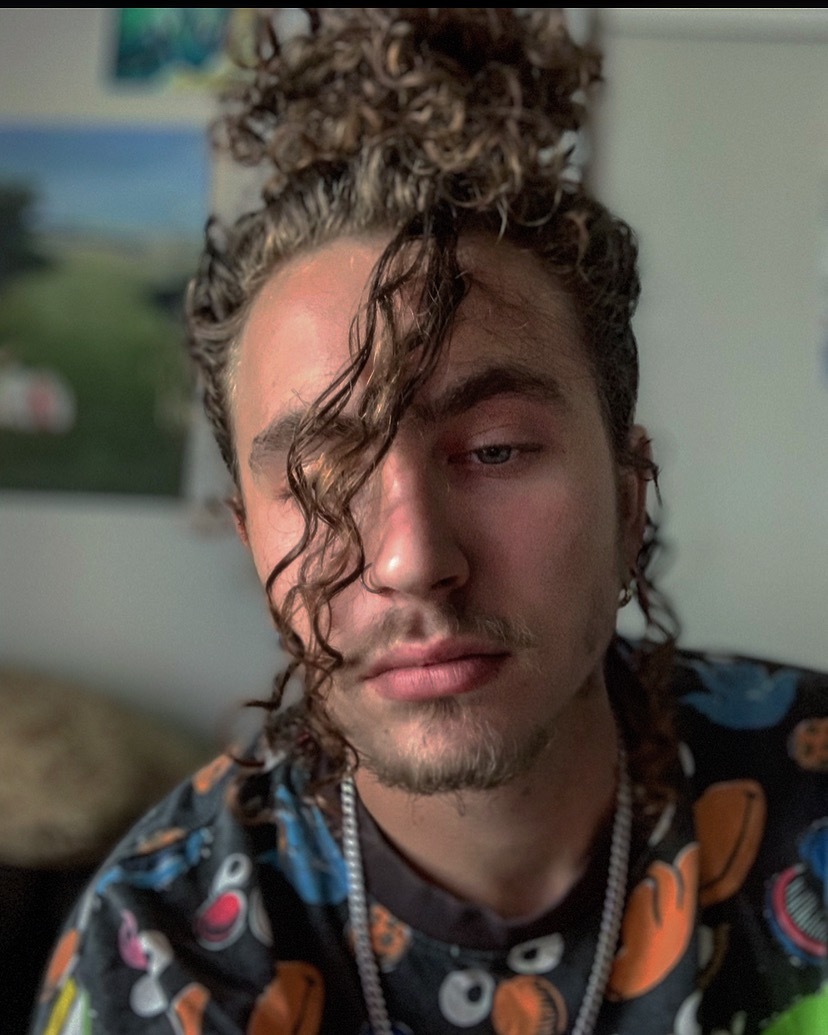 Placeholder headshot for Logan Pins.