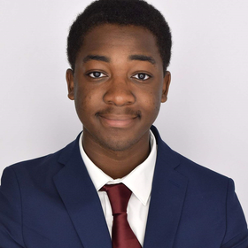 Moctar Ayeva’s headshot.