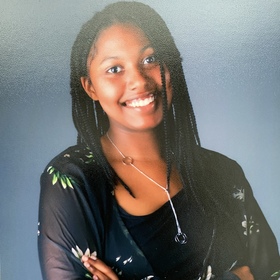 Qubilah Montgomery’s headshot.