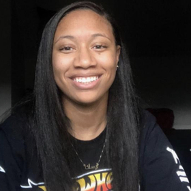 Issata Green’s headshot.