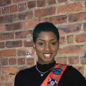 Teiko Kuma’s headshot.