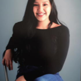 Taylor Reyes’ headshot.