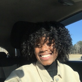 Zola Morgan’s headshot.