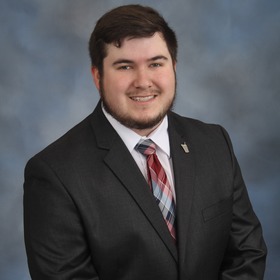 Dexter Buschor’s headshot.