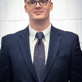 Trevor Kelly’s headshot.