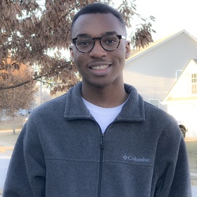 Joshua Suber’s headshot.