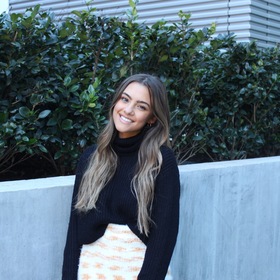 Gabriella Velaj’s headshot.