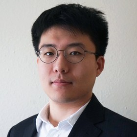 Aoxing Zhang’s headshot.