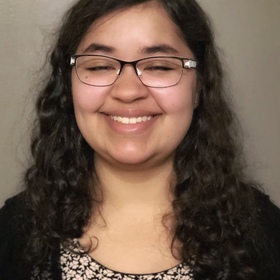 Ariel Steele’s headshot.