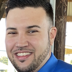 Adam Pichoff’s headshot.