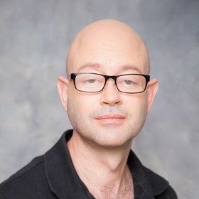 Itamar Grutman’s headshot.