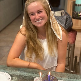 Meagan Greenzaid’s headshot.