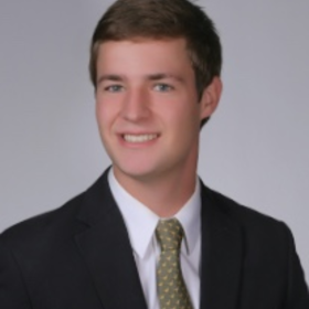 William Dupre’s headshot.