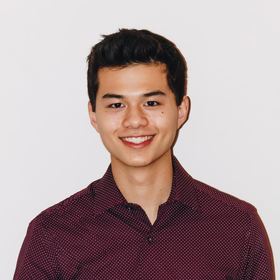 Alex Madison’s headshot.