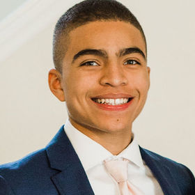 Daniel Collins’ headshot.