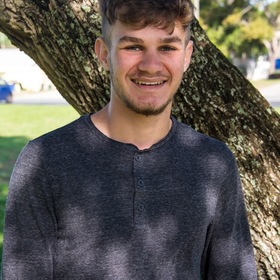 Adam Snoll’s headshot.