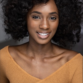 Adrielle Burroughs’ headshot.