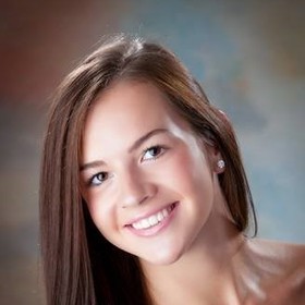 Mackenzie Denny’s headshot.
