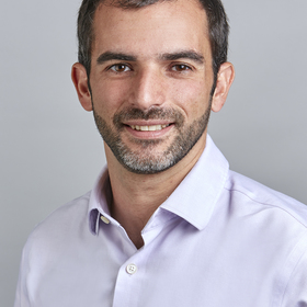 Benjamin Brewer’s headshot.