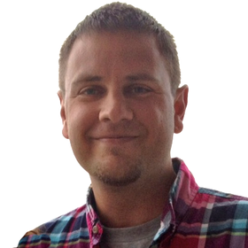 Eric Wallace’s headshot.