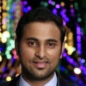 Abhishek S Bharadwaj’s headshot.