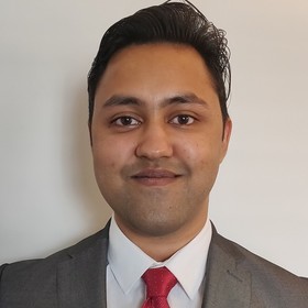 Anand Dad’s headshot.