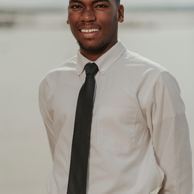 Jamar Sequeira’s headshot.