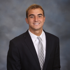 John McLean’s headshot.