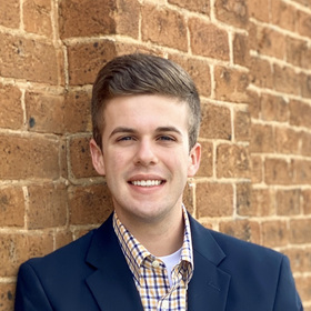 James Mulcay’s headshot.