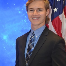 William Cooper’s headshot.