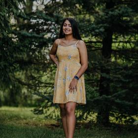 Maya Iyer’s headshot.