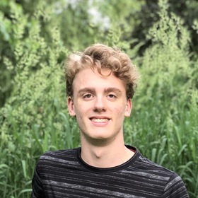 Joshua Moore’s headshot.