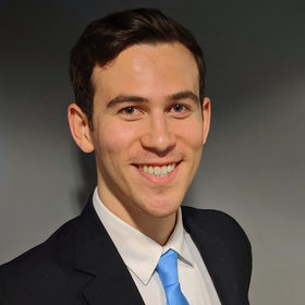 Jake Present’s headshot.