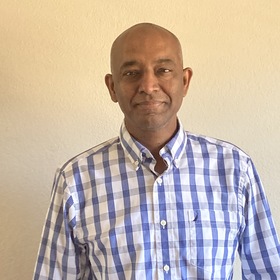 Mani Narasimhan’s headshot.