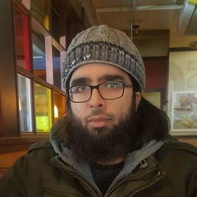 Mohammed Godil’s headshot.