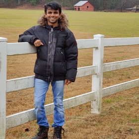 Rohit Mujumdar’s headshot.