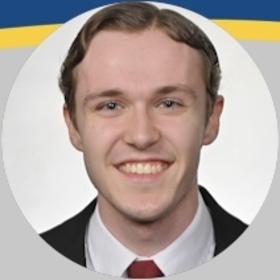 Joshua Grindland’s headshot.