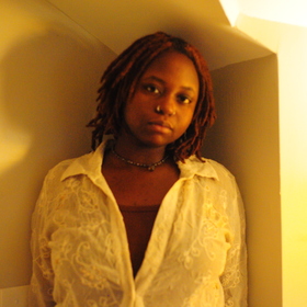 Adhis Opinya’s headshot.